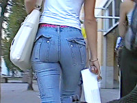On a sunny day like this there's nothing like taking a walk with my hidden cam and filming sexy cuties in tight blue jeans